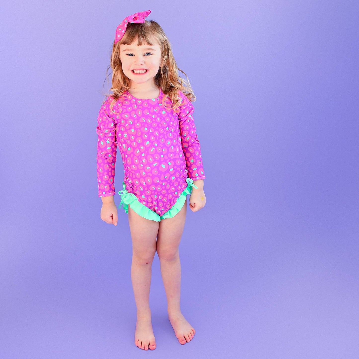 Tara Leopard LONG SLEEVE RASH GUARD SWIMSUIT